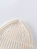 Close-up of a beige knit beanie on a light gray background Baby Ribbed Beanie - Ecru Baby boy