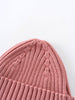 Close-up of a pink knitted beanie on a light gray background Baby Ribbed Beanie - Rosehip Baby girl