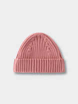 Pink knit beanie on a light gray background Baby Ribbed Beanie - Rosehip Baby girl