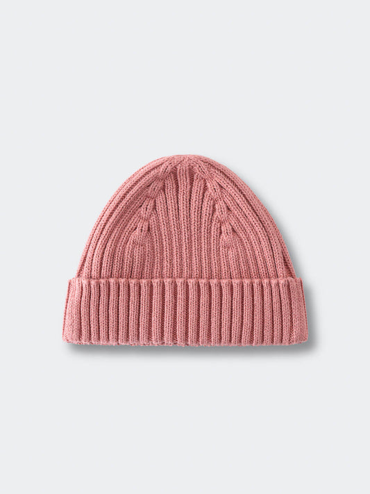 Pink knit beanie on a light gray background Baby Ribbed Beanie - Rosehip Baby girl