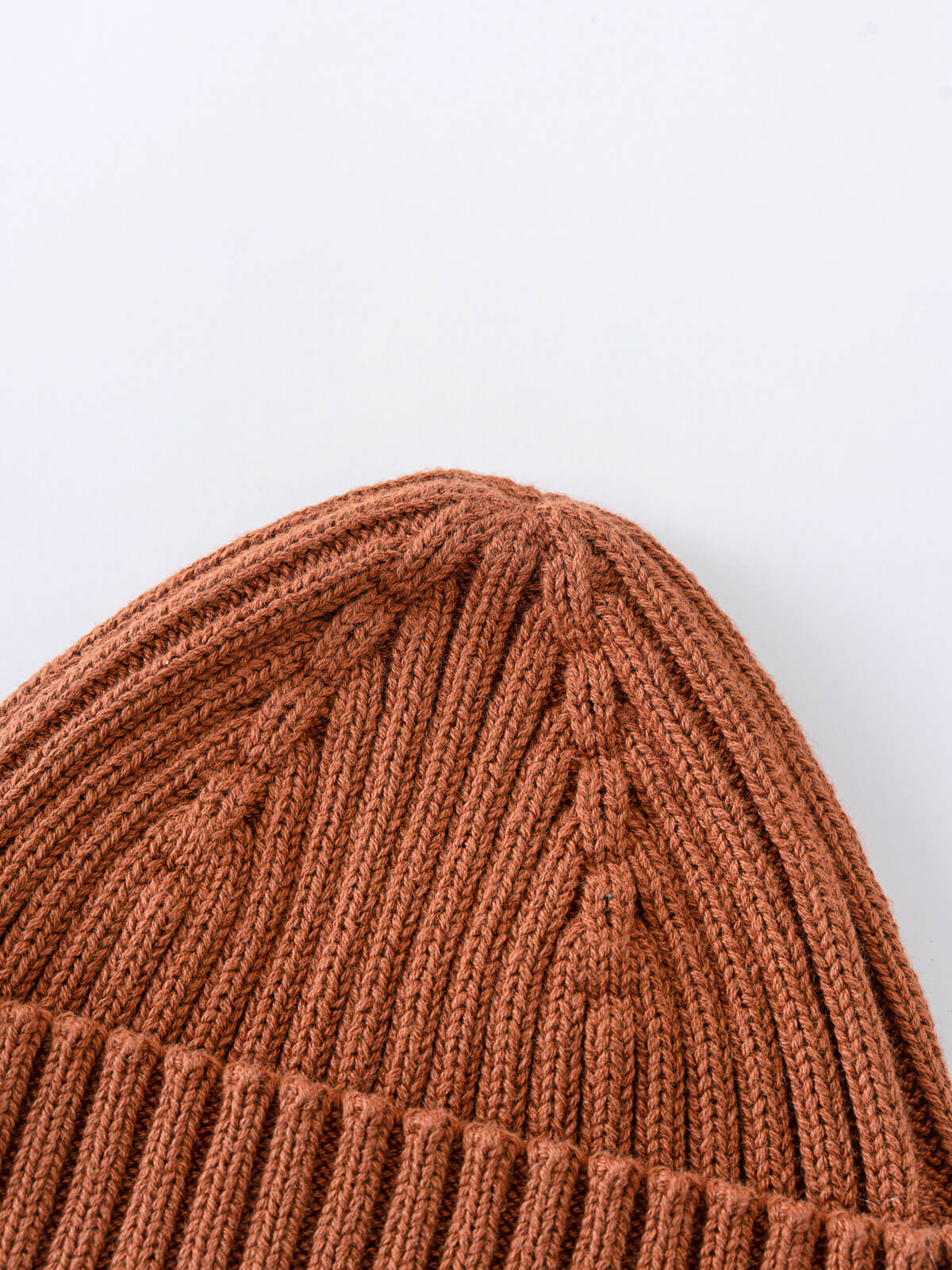 Close-up of a brown knitted beanie on a light gray background Baby Ribbed Beanie - Russet Baby boy