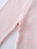Close-up of pale pink ribbed fabric showing textured detail and sleeve Baby Ribbed Leggings - Candy Floss Baby girl