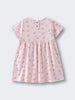 Light pink dress with floral print and button closure at back Baby Short Sleeve Jersey Dress - Daisy Chain Baby girl