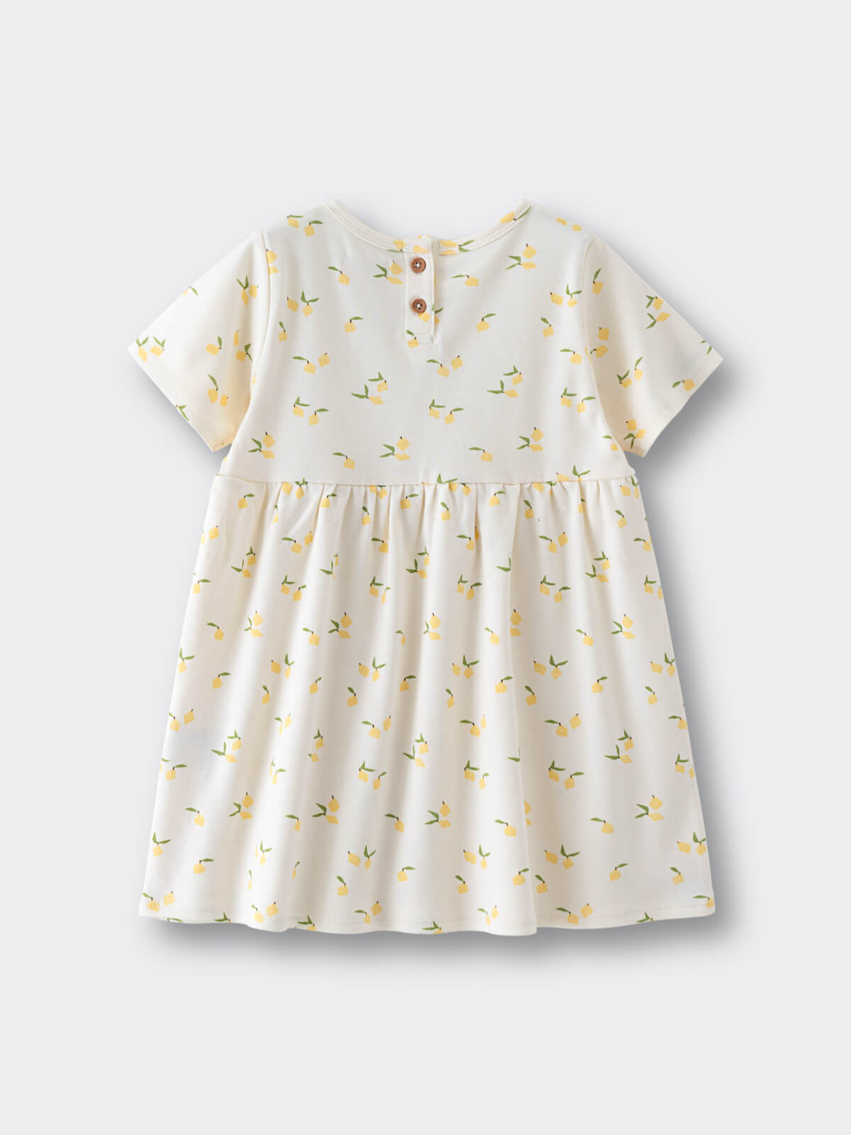 White dress with yellow lemon print and button closure at back Baby Short Sleeve Jersey Dress - Lemons Baby girl