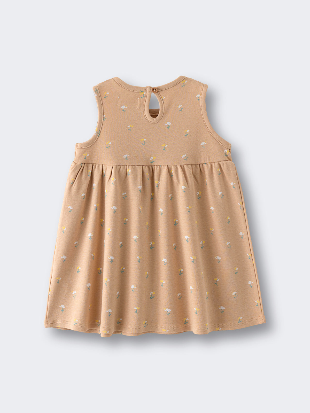 Beige sleeveless dress with small floral print pattern laid flat Baby Sleeveless Jersey Dress- Floral Bloom Baby girl