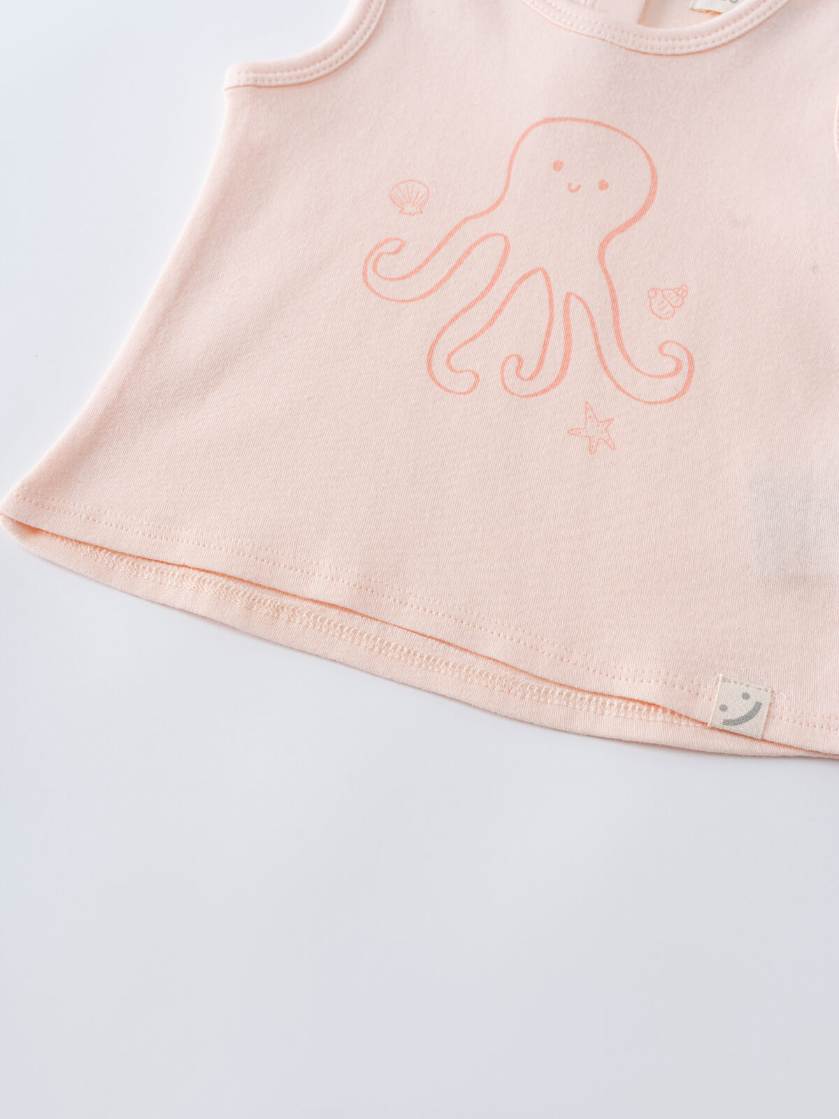 Close-up of a pale pink sleeveless tee with embroidered octopus design Baby Sleeveless Tee - Octy Baby girl