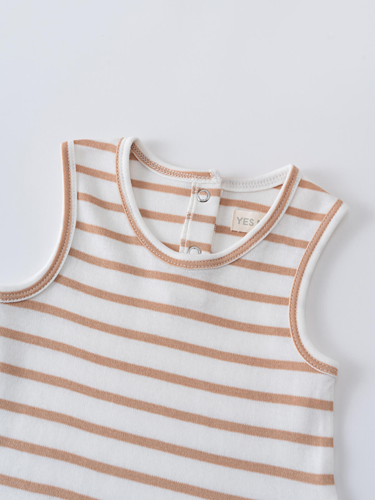 Close-up of a striped sleeveless baby shirt with button closure at neck baby Sleeveless Tee - Sand Stripe Baby boy