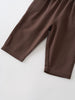 Close-up of brown ribbed fabric pants with visible seams and hem details Baby Twill Pants - Spruce Baby boy