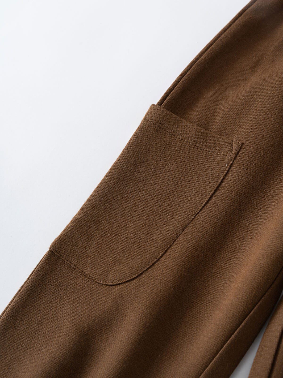Close-up of brown sweatpants showing a cargo pocket detail Cargo Sweatpants - Spruce Boys