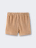 Beige terry cloth shorts with elastic waistband on light background Carter Towelling Shorts - Sand Baby boy