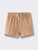 Beige terry cloth shorts with white drawstring on gray background Carter Towelling Shorts - Sand Baby boy