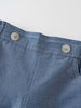 Close-up of blue chambray shorts with white buttons and stitching detail Chambray Shorts - Blue Chambray Girls