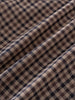Close-up of checkered shirt fabric with brown, beige, and blue pattern Check Shirt - Muslin Cotton Check Boys