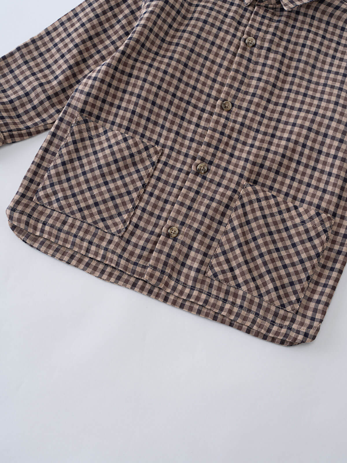 Brown and black checkered shirt on a white background Check Shirt - Muslin Cotton Check Boys
