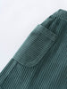 Close-up of a green corduroy skirt with a pocket on a white background