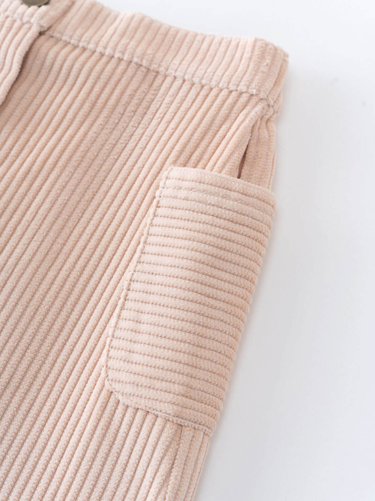 Close-up of a beige corduroy skirt on a white background Corduroy Skirt - Clay Girls