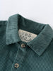 Close-up of teal corduroy collar with beige label and buttons Corduroy Jacket - Balsam Girls and Boys