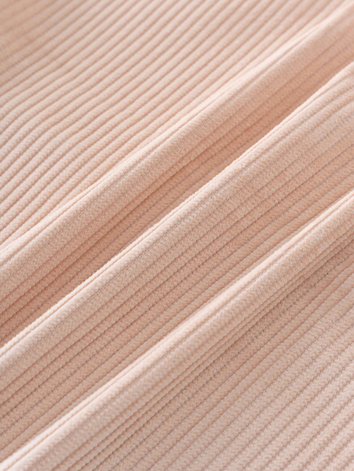 Close-up of beige corduroy jacket fabric with a ribbed texture Corduroy Jacket - Clay Girls and Boys