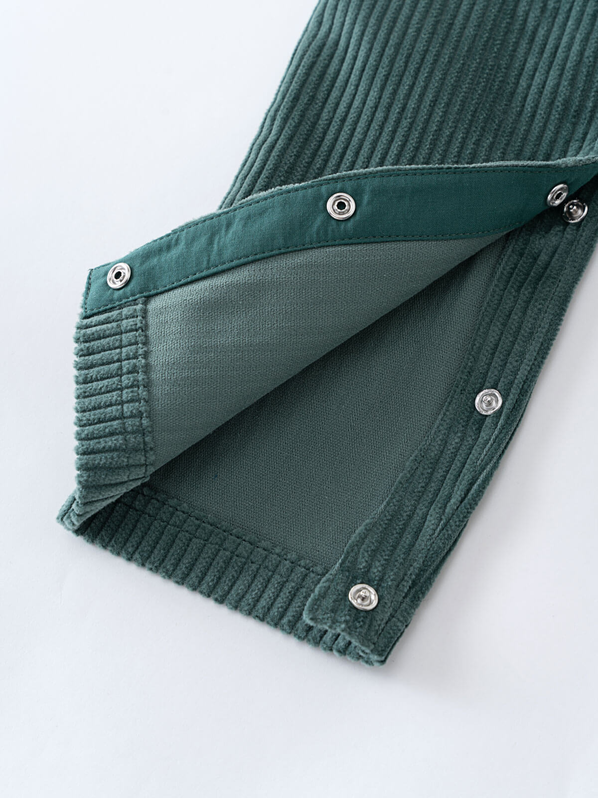 Green corduroy overalls  with button details on a white background Corduroy Overalls - Balsam Baby boy