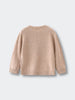 Beige sweater on a light gray background