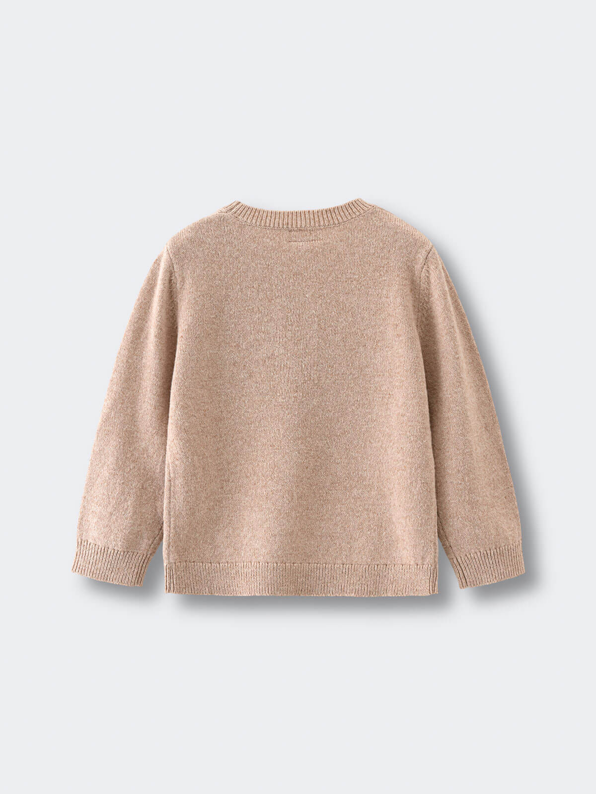 Beige sweater on a light gray background