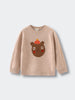 Children's sweater with bear design on a light gray background