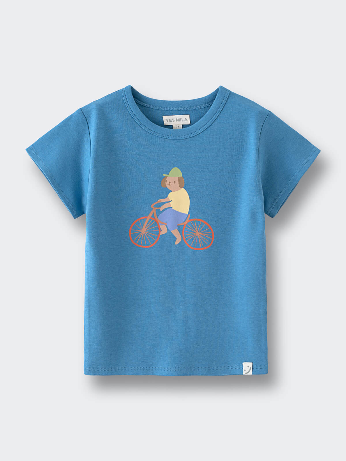 Blue t-shirt with illustrated child riding a bicycle graphic on front feature print Short Sleeve Tee - Milo Biking Boys