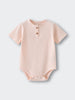 Light pink ribbed baby bodysuit with two brown buttons at neckline Henley Short Sleeve Bodysuit- Shell Pink Baby girl