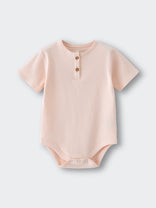 Light pink ribbed baby bodysuit with two brown buttons at neckline Henley Short Sleeve Bodysuit- Shell Pink Baby girl