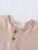 Close-up of a striped shirt with brown buttons and visible label Henley Tee - Sand Stripe Baby boy