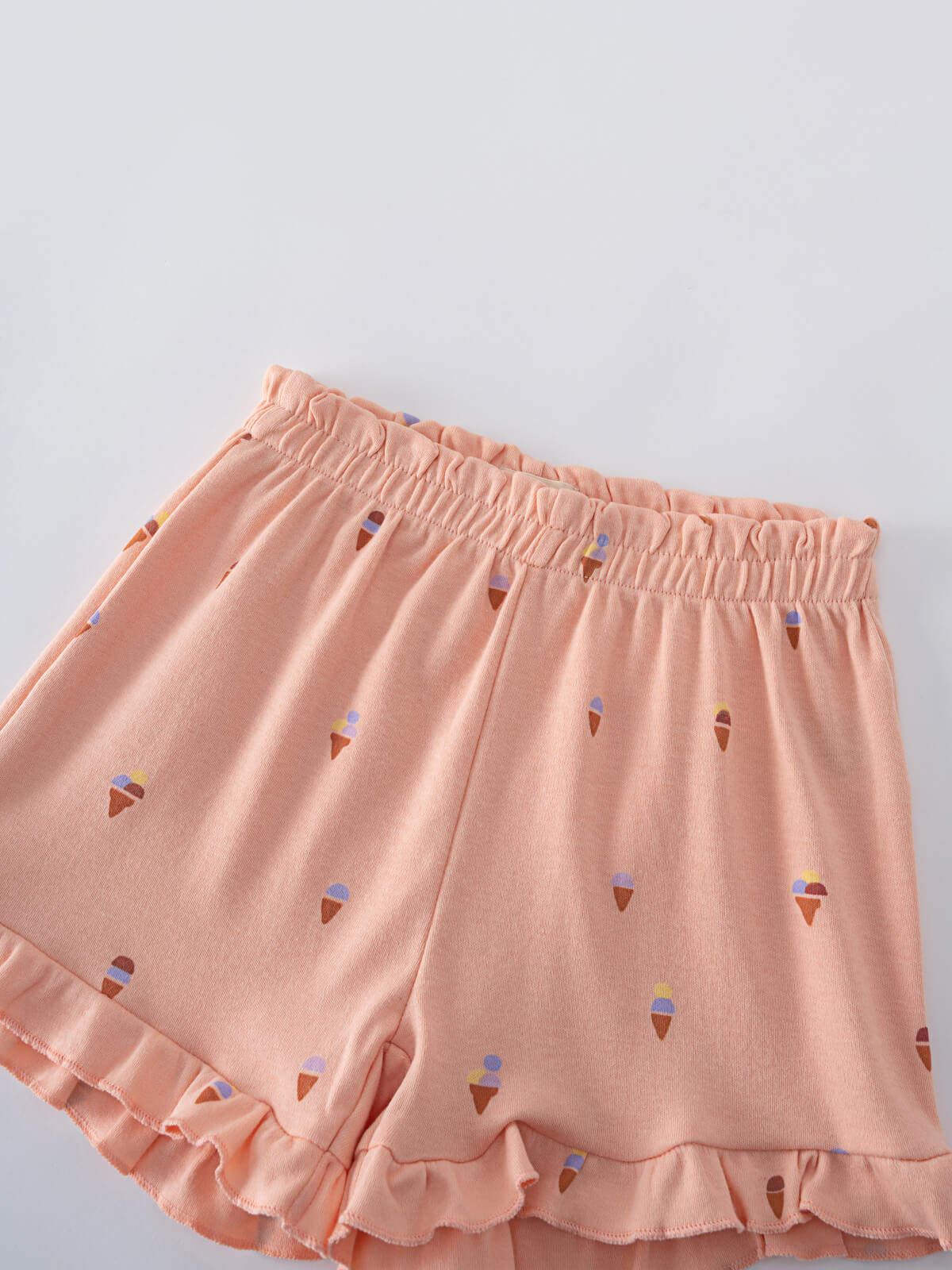 Pink shorts with ice cream print and ruffled hem detail Jersey Shorts - Ice Creams Girls