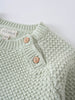 Close-up of a mint green knitted baby sweater with wooden buttons Knit Jumper - Mint Baby boy