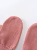 Pair of pink knitted mittens on a light gray background Knit Mittens - Rosehip Girls