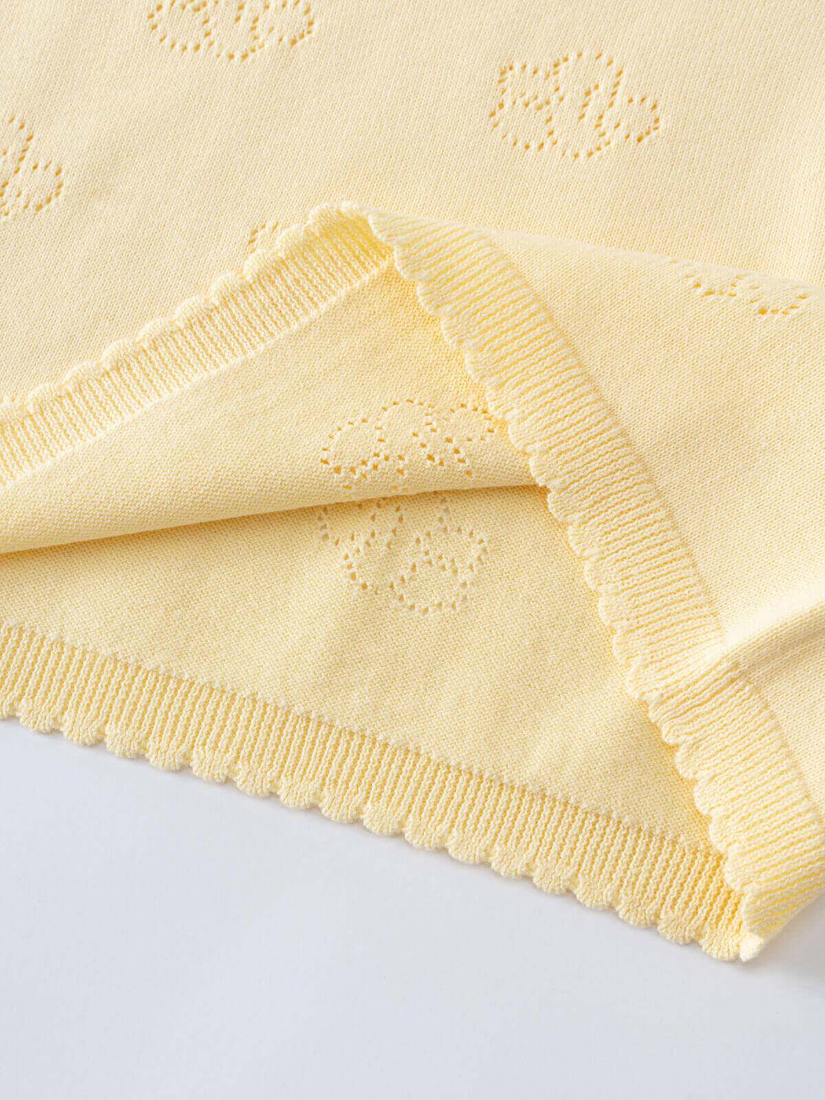 Close-up of pale yellow knit fabric with eyelet detail and fringe trim Knit Tee - Sun Soaked Girls