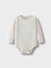Cream-colored baby bodysuit with small floral print pattern on light background Long Sleeve Bodysuit - Spring Bloom Baby girl