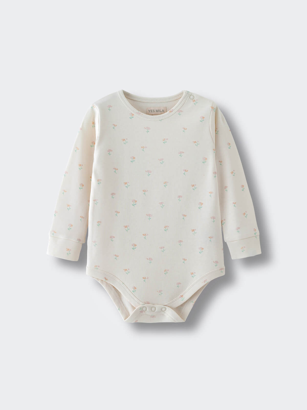 Cream-colored baby bodysuit with small floral print pattern on light background Long Sleeve Bodysuit - Spring Bloom Baby girl