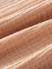 Close-up of peach-colored woven fabric with visible texture and soft folds Muslin Long Sleeve Shirt - Sand Boys