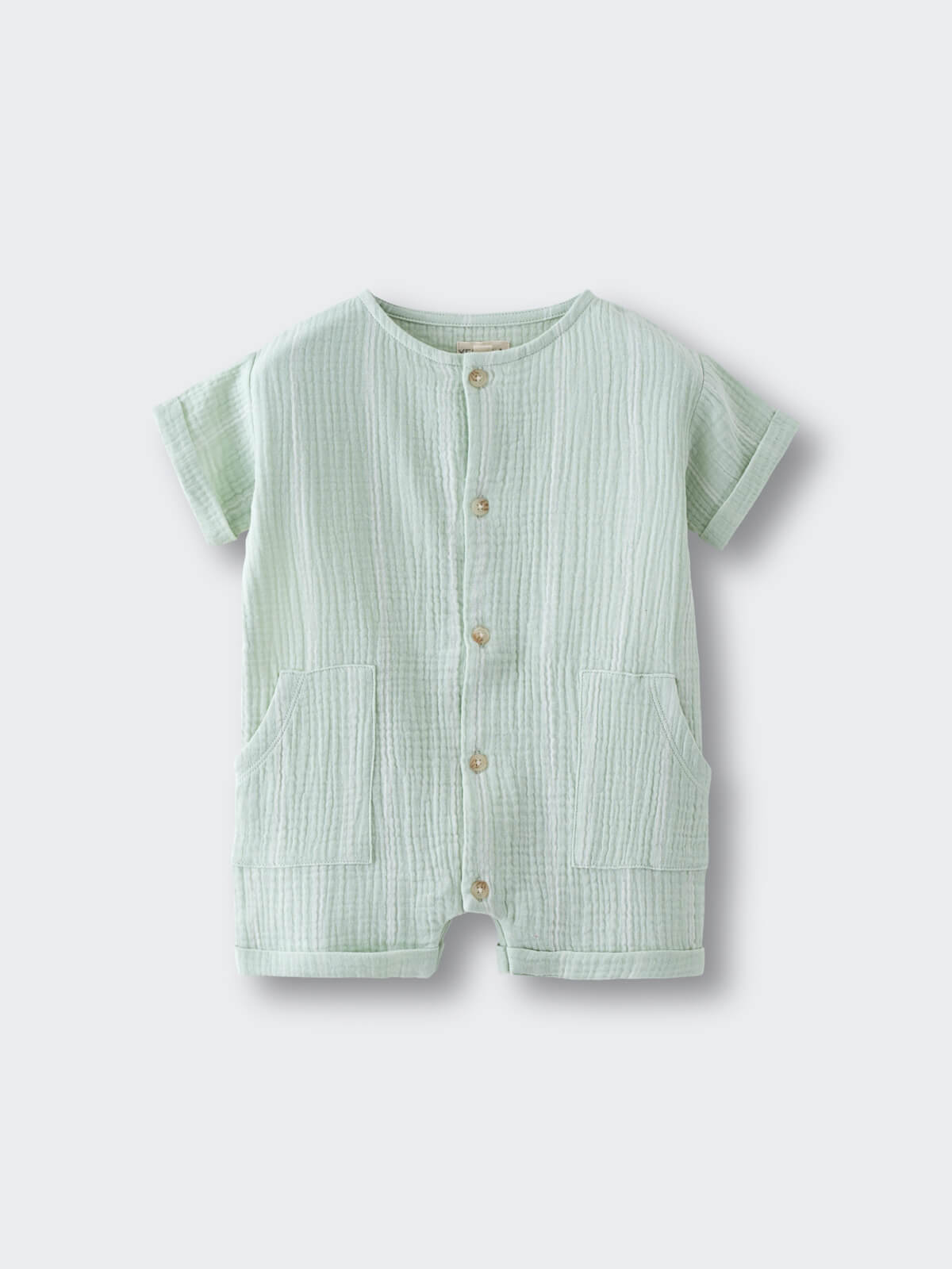 Light green striped baby romper with button front and two pockets laid flat Muslin Romper - Light Green Stripe Baby boy