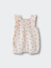 White baby romper with orange floral print and ruffle straps muslin Romper - Petal Paws Baby girl