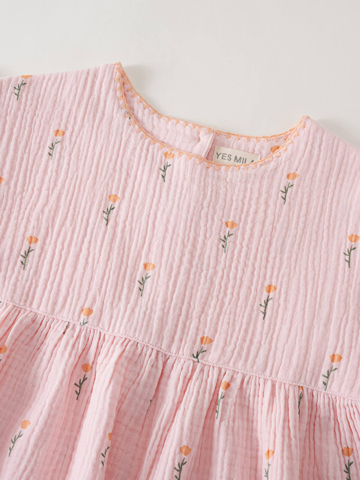 Pink dress with floral patterns on a white background Muslin Dress - Poppy Field Girls