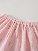 Close-up of pink gathered waistband on floral embroidered fabric skirt Muslin Skirt - Poppy Field Girls