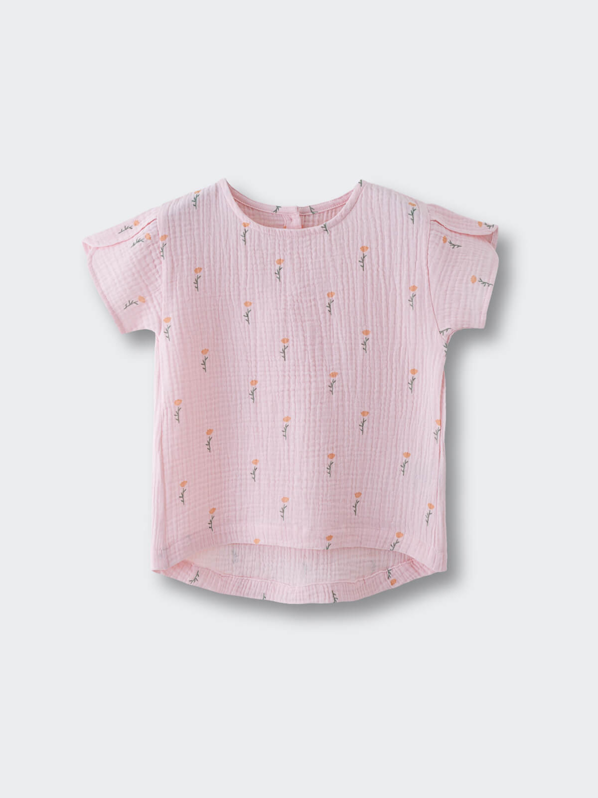 Pink textured shirt with small floral print laid flat on white background Muslin Top - Poppy Field Girls