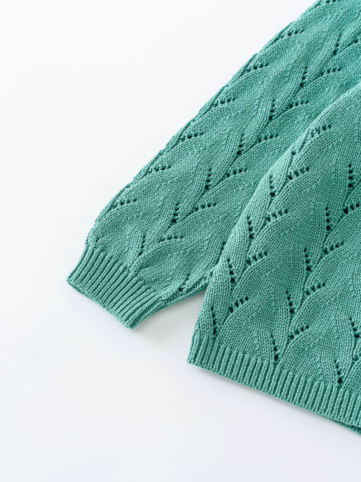 Green knitted cardigan with a detailed pattern on a white background Pointelle Cardigan - Balsam Girls