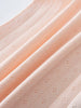 Close-up of peach-colored ribbed fabric with small eyelet pattern details Pointelle Singlet Bodysuit - Shell Pink Baby girl