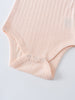 Close-up of ribbed baby bodysuit with snap buttons at crotch Pointelle Singlet Bodysuit - Shell Pink Baby girl
