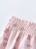 Close-up of pale pink fabric with floral embroidery and gathered elastic waistband Printed Bloomers - Daisy Chain Baby girl