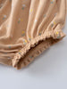 Close-up of beige fabric bloomers with small floral print and elastic gathering Printed Bloomers - Floral Bloom Baby girl