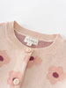 Pink knitted cardigan with floral patterns and button details on a white background Printed Cardigan - Bold Daisy Girls