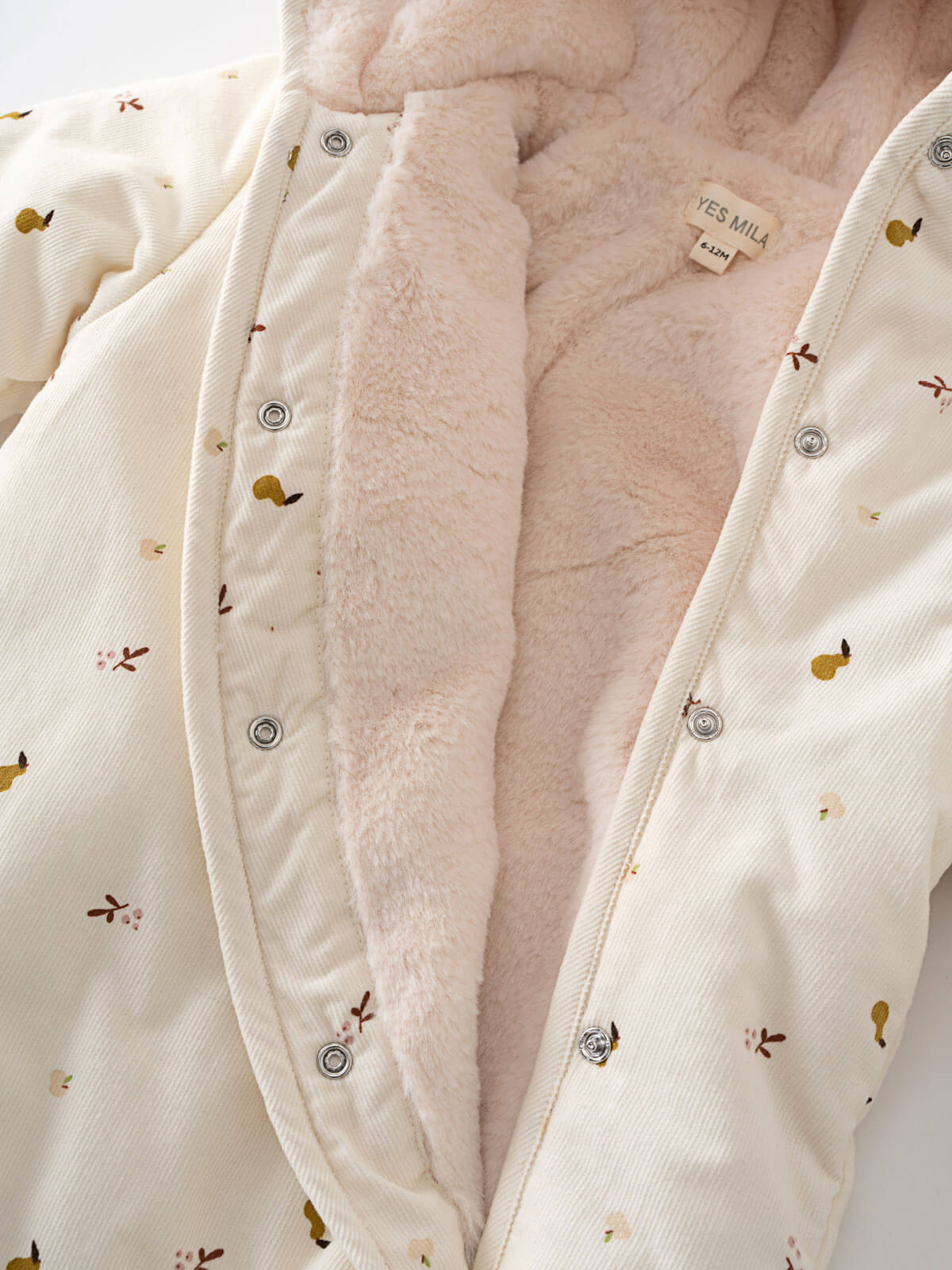 Cream hooded baby pram suit with fruit pattern on a light gray  Printed Pram Suit - Autumn Harvest Ecru Baby girl