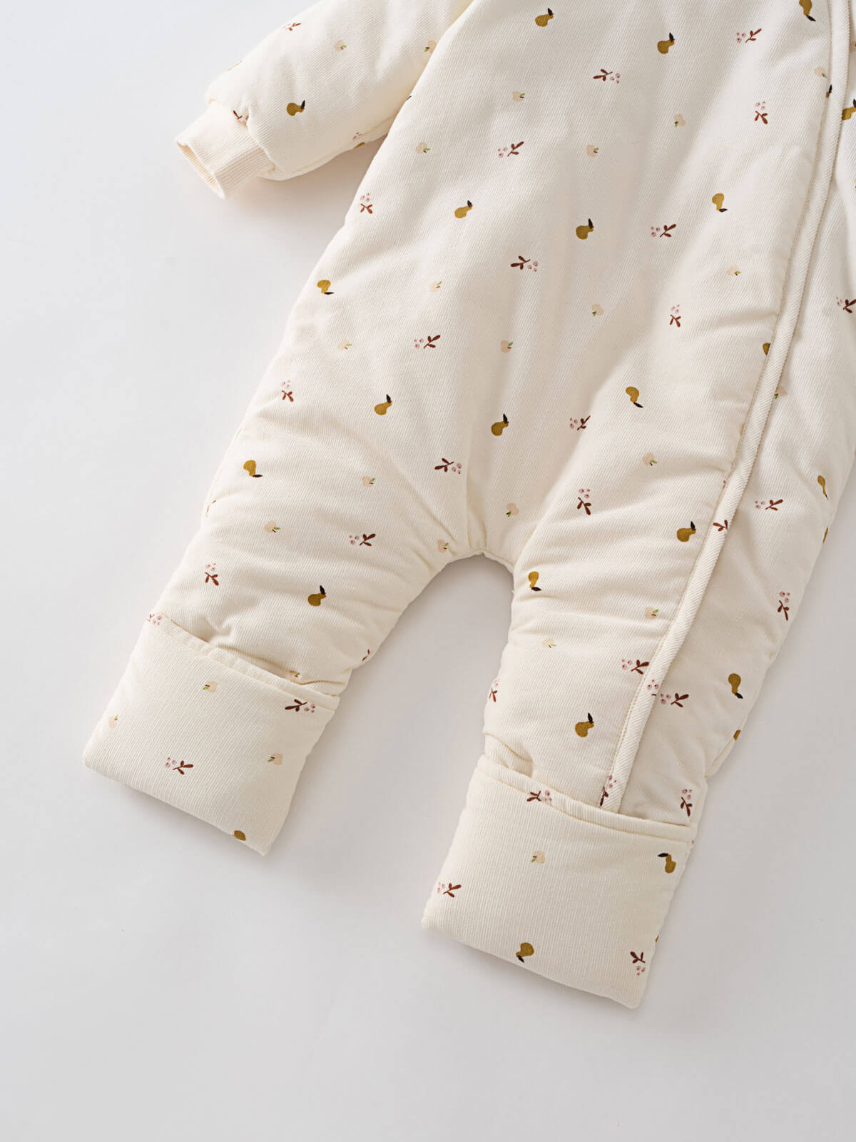 Cream hooded baby pram suit with fruit pattern on a light gray  Printed Pram Suit - Autumn Harvest Ecru Baby girl
